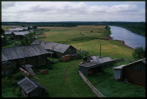 Log houses along Kimzha River, view south, Kimzha, Russia; 2000