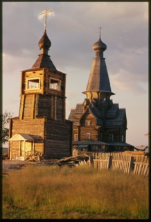 Bell tower (2001), with Church of Dormition (1674), Varzuga, Russia; 2001