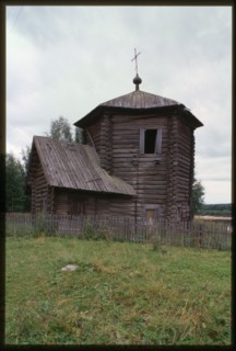 Log Church of the Epiphany (also known as Nativity of the Virgin, oldest wooden structure in the Urals, 1617), southwest view, Pianteg, Russia; 2000