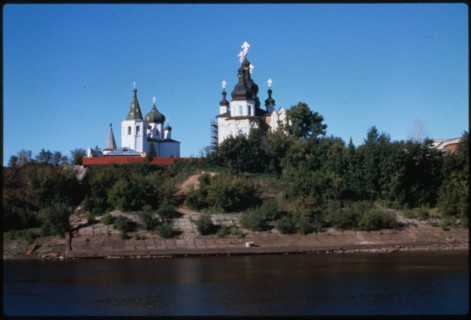 Trinity Monastery, east panorama with Trinity Cathedral (1715) (right), and the Church of Saints Peter and Paul (1755) (left), and Tura River in foreground, Tiumen', Russia 1999.