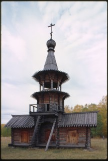 Log Church of the Savior from the village of Zashiversk (1700), bell tower, east facade, moved and reassembled in the Outdoor Architecture and History Museum at Akademgorodok, Russia 1999.