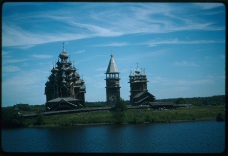 Pogost ensemble, Church of the Transfiguration (1714) (left); bell tower (19th century); Church of the Intercession (1764), west view, Kizhi Island, Russia; 1993