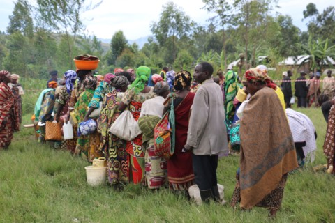 Rural residents stand in a line while they wait for help from relief workers during a crisis in North Kivu Cote d’Ivoire (Ivory Coast) ca. 22 March 2017
