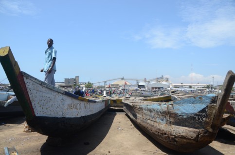 Boats on dock at fishing port of Tema in Ghana  ca. 19 October 2011