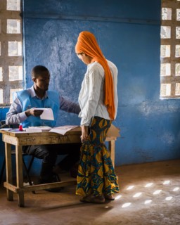 Sierra Leone woman participating in a local activity, possibly voting ca. 7 March 2018
