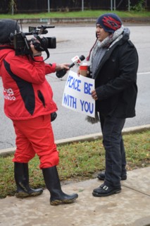 Peace Rally demonstratration outside a mosque in support of the local Muslim community  Irving, TX,  USA (November 28, 2015)
