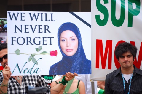 Iranians in Texas taking part in a Freedom for Iran / Green Revolution rally at Dallas City Hall plaza in downtown Dallas, TX ca. June 2009