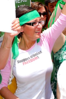 Iranians in Texas taking part in a Freedom for Iran / Green Revolution rally at Dallas City Hall plaza in downtown Dallas, TX ca. June 2009
