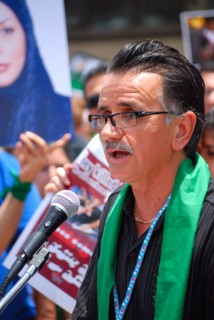 Iranians in Texas taking part in a Freedom for Iran / Green Revolution rally at Dallas City Hall plaza in downtown Dallas, TX ca. June 2009