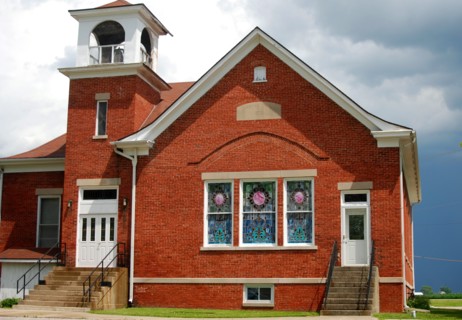 Red brick church on the plains of East Central Illinois, Hindsboro Christian Church on a cloudy day