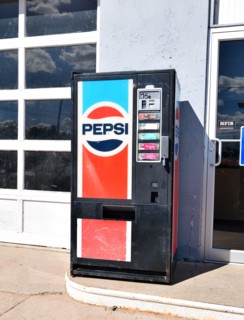 Vintage Pepsi Cola Machine sits outside a service station in a small northeastern Colorado town