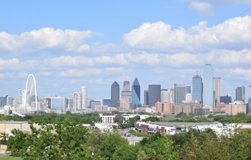 Skyline of Dallas Texas on a partly cloudy spring afternoon