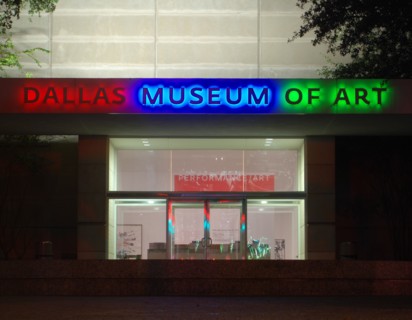 Night photo of the Dallas Museum of Art side entrance in Dallas, TX