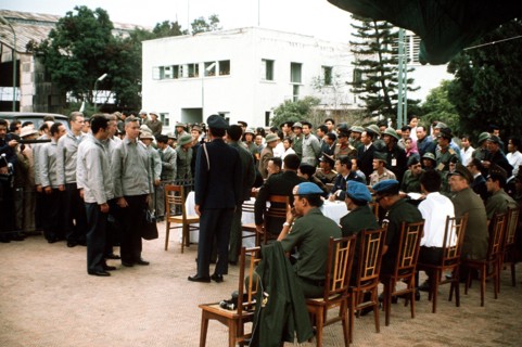 Col. Lynn is greeted by the Gia Lam Airport returnee delegation