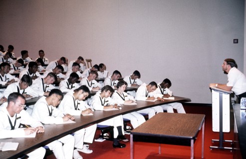 Midshipmen attend class at the U.S. Naval Academy.