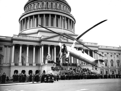 A helicopter type aircraft lands at the U.S. Capitol ca. April 28