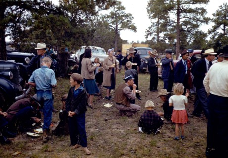 Crowd eating free barbeque dinner at the Pie Town