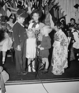 Diplomatic children broadcast Xmas greeting. Washington