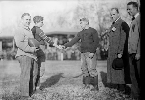 Football players shaking hands at Georgetown University football game