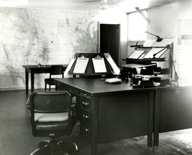 Forecast Desk With World Map on Wall Scottsbluff