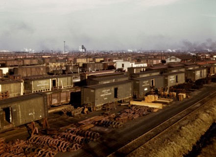 Freight cars being maneuvered in a Chicago and Northwestern [i.e. North Western] railroad yard