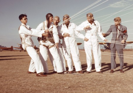 Instructor explaining the operation of the parachute to students