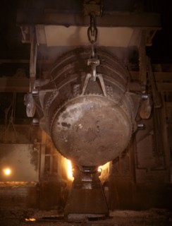 Ladle of molten iron is poured