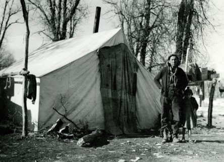 Man and Child in Front of Tent