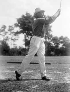 Man playing golf in 1914