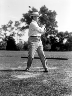 Man playing golf in 1914