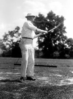 Man playing golf in 1914