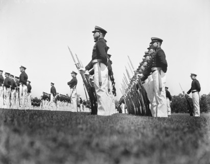 Navy midshipmen drilling