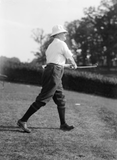 Politician playing golf ca. 1917