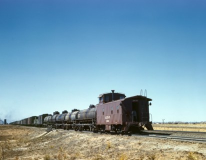 Santa Fe R.R. west bound freight stopping for water