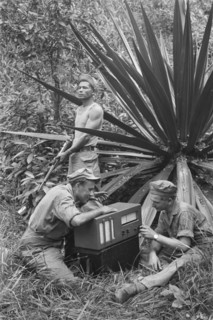 Indonesia History - 'Jungleradio'. Soldiers working on a field radio; Date December 1946; Location Indonesia, Dutch East Indies