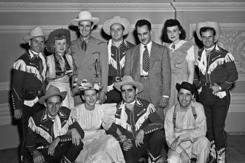 Portrait of Shorty Warren, Rosalie Allen, Ernest Tubb, Cy Sweat, Dave Miller, Radio Dot, Smokey Warren, Dick Richards, Minnie Pearl, Bob McCoy, and Smokey Swan, Carnegie Hall, New York, N.Y., Sept. 18...