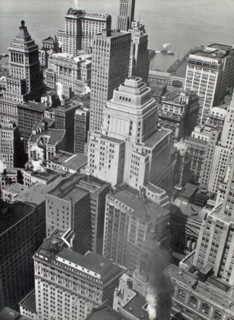 Hudson River and piers just visible at top of view of buildings in lower Manhattan ca. 1938
