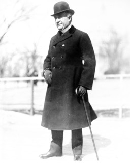 Photo shows New York politician William Bourke Cockran (1854-1923), standing with cane