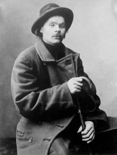 Maxim Gorky, seated with heavy coat on 2 7 1910