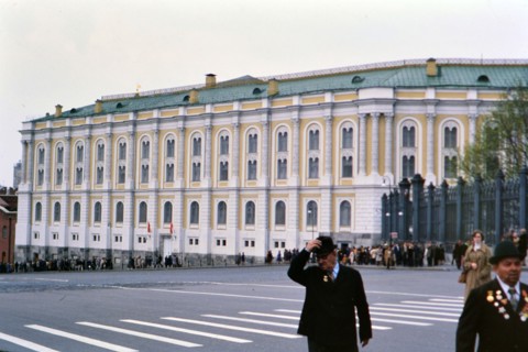 Pedestrians outside of the Armory Museum in Moscow Russia on a cool spring day in late 1970s (1978)