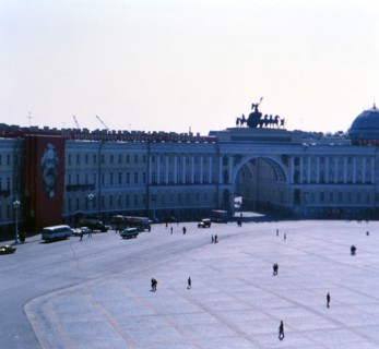 Pedestrians outside of a building (Ministries Buidling) on a cool spring day in St. Petersburg Russia in late 1970s (1978)