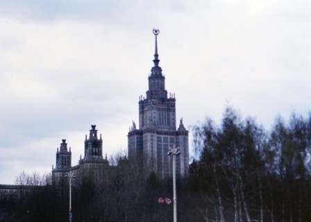 Buildings and architecture in a major city in Russia, communist star on top of building - Moscow State University ca. 1978
