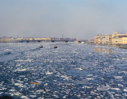 Ice patches on partially frozen river in a major city in the U.S.S.R. (Russia) in the late 1970s (1978)