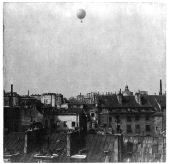 Captive balloon of Henri Giffard over Paris, 1878; high above rooftops