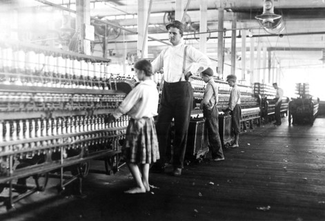 A young spinner in Yazoo City Yarn Mills. Said she was 13, but doubtful, May 1911