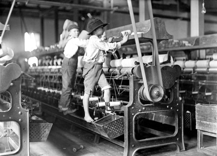 Dangerous work for young children in a textile factory.