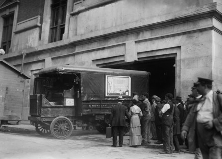 Photograph shows American Express trucks transporting gold shipped by Great Britain to New York City for safe-keeping during World War I ca. September 8, 1915