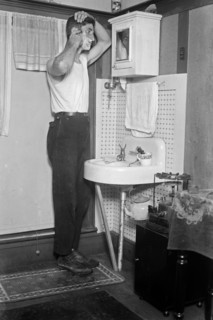 Man shaving in a home in Broad Channel, Queens ca. 1910-1915