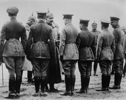 Kaiser Wilhelm II of Germany (1859-1941) giving iron cross medal to aviators during World War I ca. 1914-1915