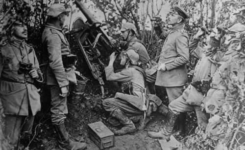 German soldiers with a anti-aircraft machine gun, looking for airplanes during World War I ca. 1914-1915